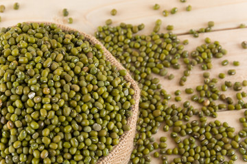 green beans on wood background