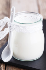 Homemade yoghurt in a glass jar.selective focus