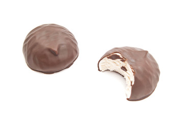 two zephyr with chocolate on white