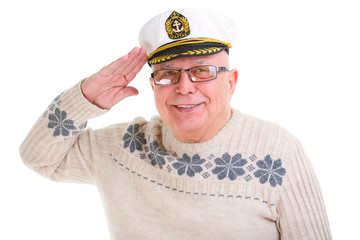 Closeup portrait of happy old senior man saluting with a boat ca