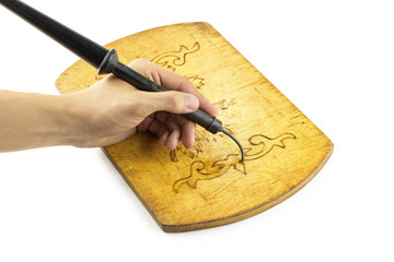 soldering iron on a wooden