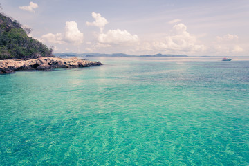 blue sky with sea and rock - film filter
