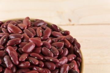 red  beans on wood background