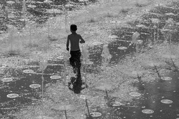 Jerusalem - playing little boy in the fountain of Teddy Park.