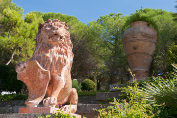 Fototapeta na wymiar Ceramic lion in the public gardens of Caltagirone, Sicily