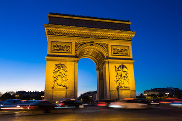 The Triumphal Arch at night , Paris, France.