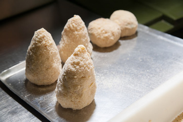 The making of sicilian arancini