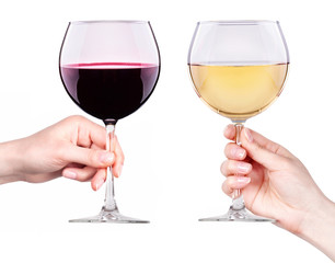 Glasses of red and white wine in hand isolated