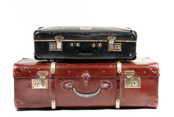 Vintage suitcases on white background