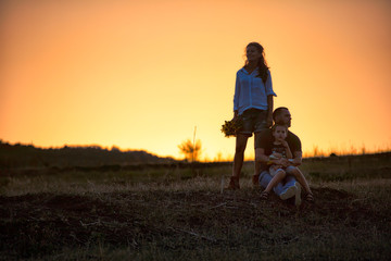 Fototapeta na wymiar Family portrait at sunset