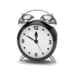 Black alarm clock on white