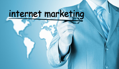 business man writing internet marketing