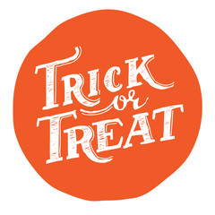 Hand drawn vintage halloween text with hand lettering and decoration. Trick or treat. This text can be used as a greeting card element or print.