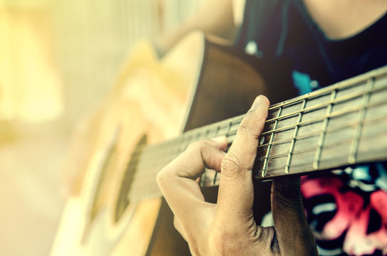 hand of man in classical guitar