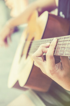 hand of man in classical guitar