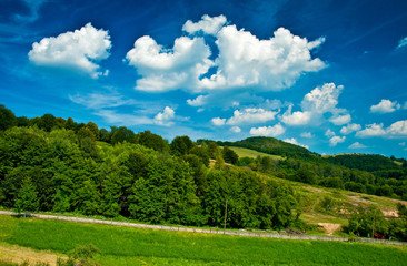 Fototapeta na wymiar Blue sky above the hills
