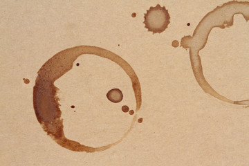 Coffee cup rings stains on a brown paper texture
