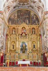 Seville - altar of baroque church Basilica del Maria Auxiliadora.