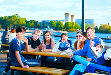 Multiethnic group of young people at lakeside park