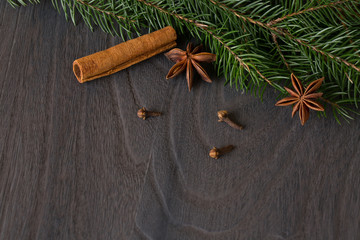 star anise and fir  on background a wooden boards