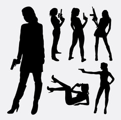 Female with gun silhouettes. Good use for symbol, logo, web icon, mascot, or any design you want. Easy to use.