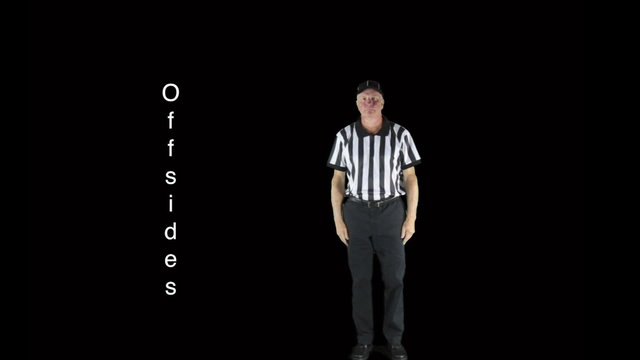 Man dressed as a football official signaling Offsides.
