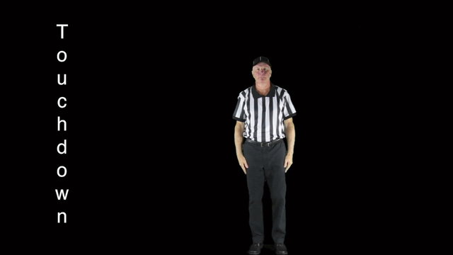 Man dressed as a football official signaling Touchdown.