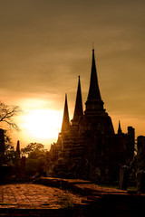 Silhouetted of Wat Phra Sri Sanphet at sunset in Ayutthaya historic park, Thailand.