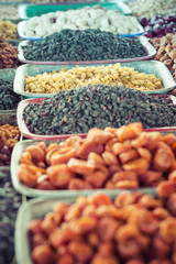 Dry fruits and spices like cashews, raisins, cloves, anise, etc.