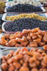 Dry fruits and spices like cashews, raisins, cloves, anise, etc.