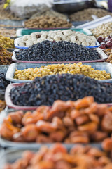 Dry fruits and spices like cashews, raisins, cloves, anise, etc.