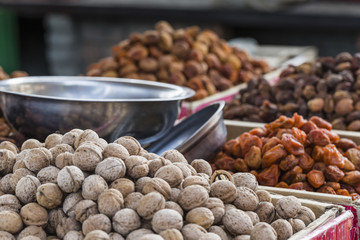 Dry fruits and spices like cashews, raisins, cloves, anise, etc.