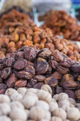 Dry fruits and spices like cashews, raisins, cloves, anise, etc.