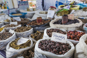 Beautiful vivid oriental market with bags full of various spices