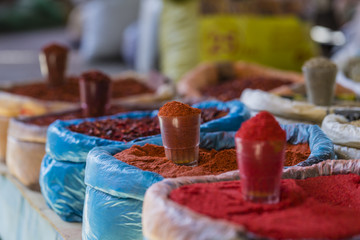 Beautiful vivid oriental market with bags full of various spices