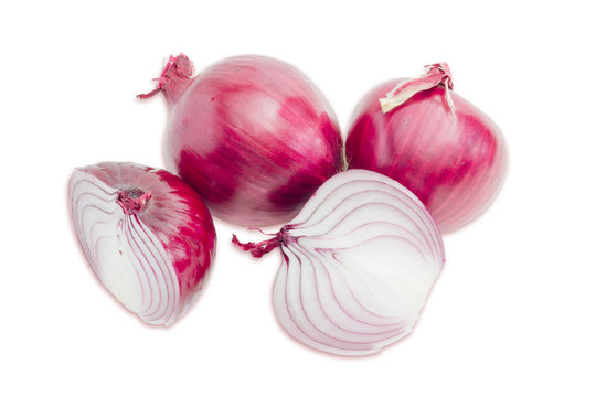 Three red onion on a light background
