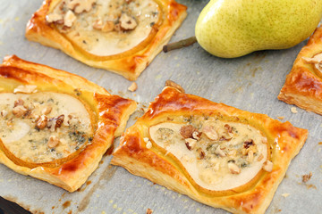 Pears baked in puff pastry with gorgonzola cheese and walnuts