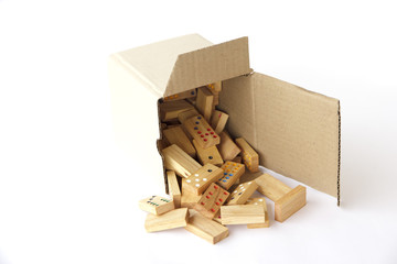 Stock Photo:.Domino in wooden box isolated on white