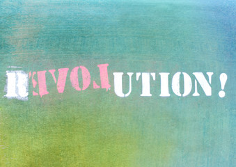revolution - love graffiti logo on textured wall