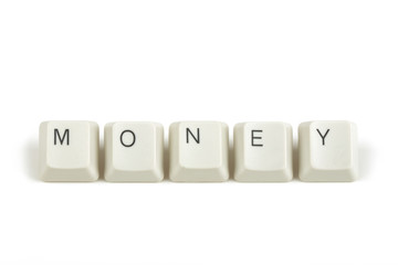 money from scattered keyboard keys on white