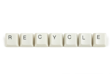 recycle from scattered keyboard keys on white