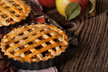 Apple pie on wooden board