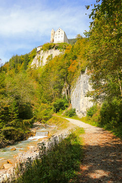The stream from Wolfsklamm gorge running next to a path that leads to St. Georgenberg monastery. It is the oldest pilgrimage site in Tyrol, Austria