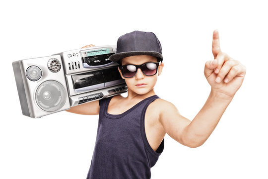 Junior rapper carrying a ghetto blaster and gesturing