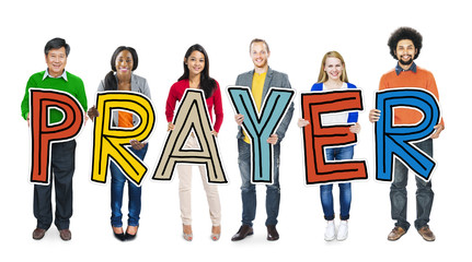 Fototapeta premium Multiethnic Group of People Holding Letter Prayer