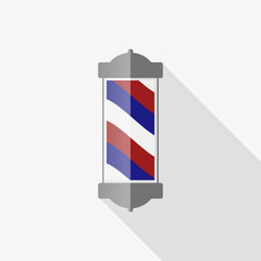 old fashioned vintage silver and glass barber shop pole with red, blue and white stripes.