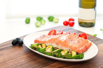 Piece of roasted salmon fillet with grilled vegetables