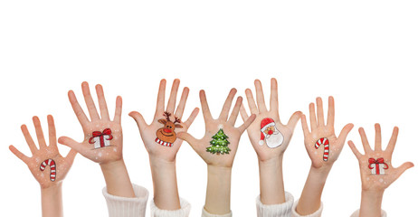 Christmas symbols painted on kid's hands. Santa, snowman, Christmas tree, present box, reindeer etc