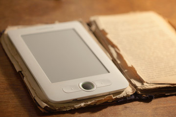 Modern e-book and old paper book