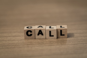 Call in wooden cubes